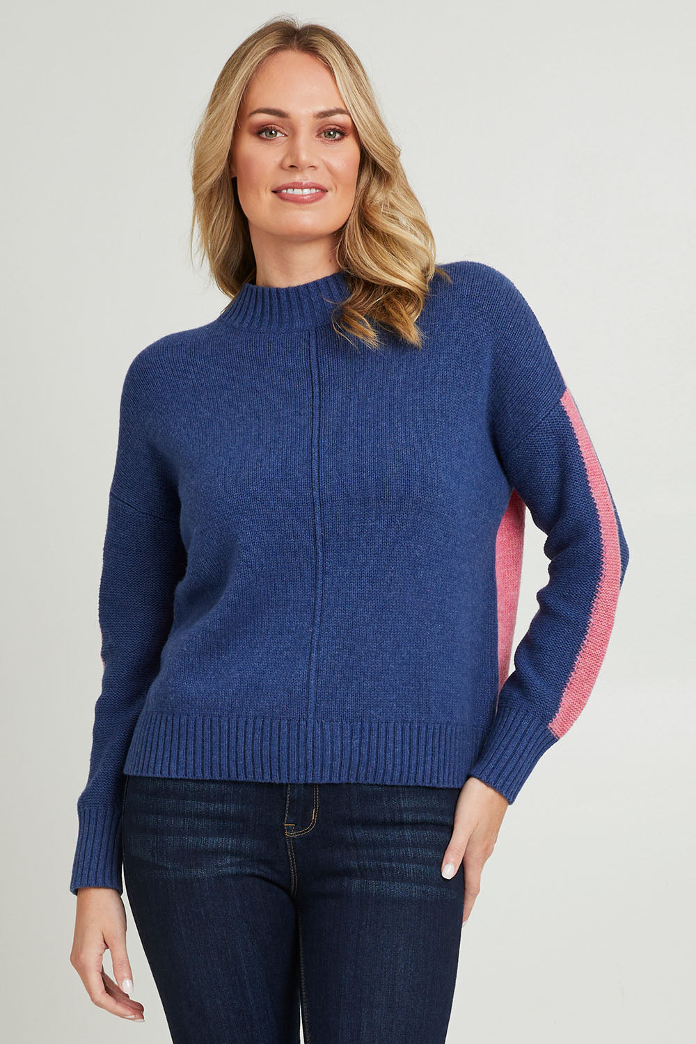 Model Grace wearing size S of the Colour Block Turtle in colour Denim (Blue), from the front, cropped image