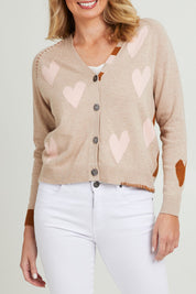 Model Grace wearing size S of the Hearts For You Cardi in colour Birch, from the front, cropped image