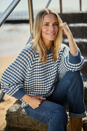 Model Maggie wearing size S of the Texture Cotton Merino Jumper in colour Denim (Blue), from the front, showing the whole outfit