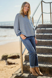 Model Maggie wearing size S of the Texture Cotton Merino Jumper in colour Denim (Blue), from the front, showing the whole outfit