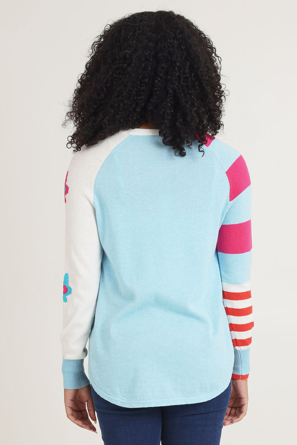 Model Ziara wearing size S of the My Happy Cotton Cashmere Jumper in colour Aqua (Blue), from the back