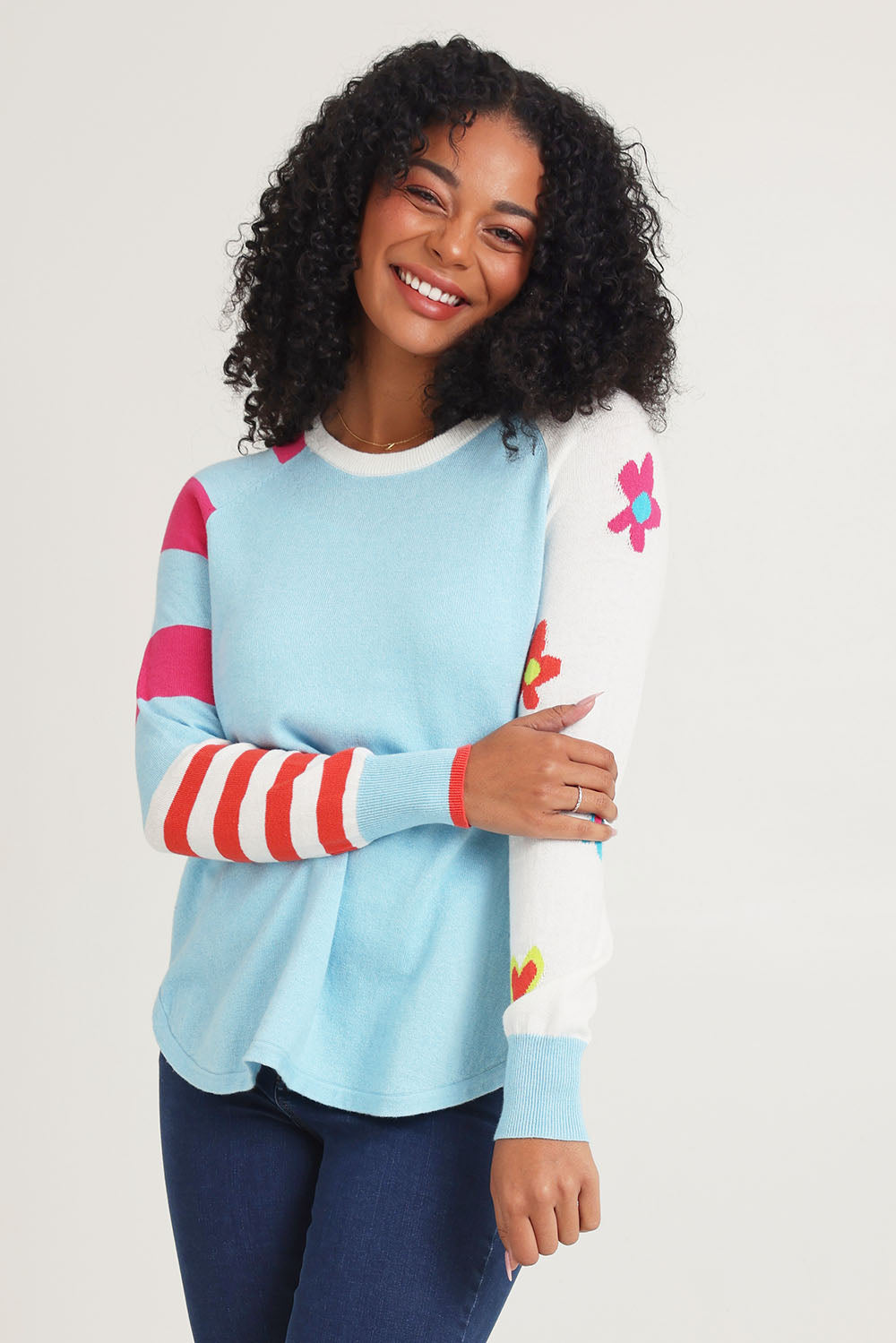 Model Ziara wearing size S of the My Happy Cotton Cashmere Jumper in colour Aqua (Blue), from the front, cropped image
