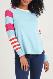 Model Ziara wearing size S of the My Happy Cotton Cashmere Jumper in colour Aqua (Blue), from the front, cropped image