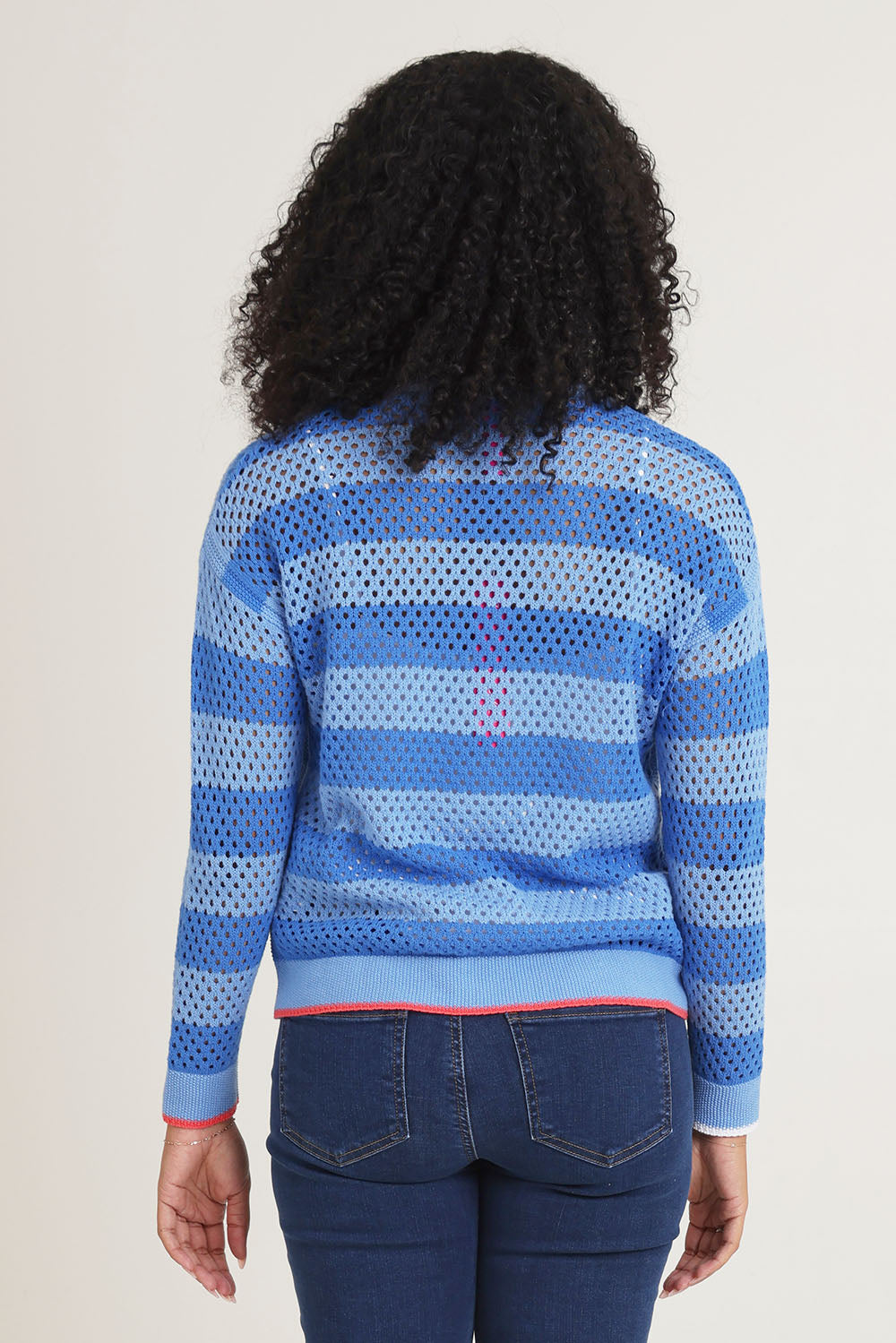 Model Ziara wearing size S of the Pointelle Zip Cotton Cardi in colour Blue (Blue), from the back