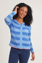 Model Ziara wearing size S of the Pointelle Zip Cotton Cardi in colour Blue (Blue), from the front, cropped image